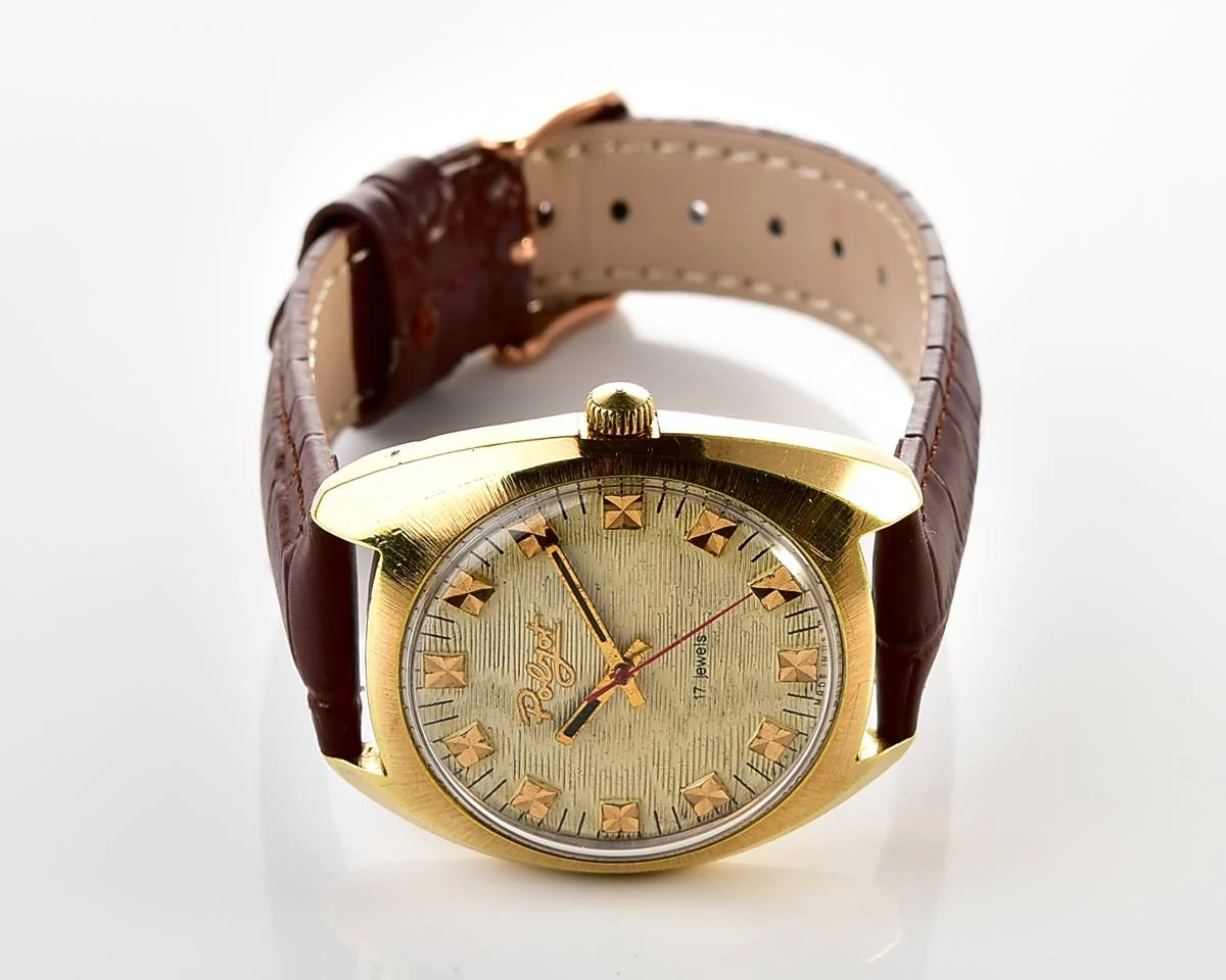 Soviet Poljot mechanical gold-plated wrist watch with intricate textured dial