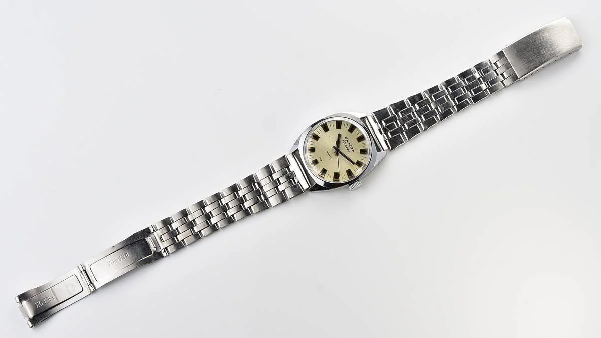 Soviet Raketa-Exacta vintage mechanical watch with steel bracelet