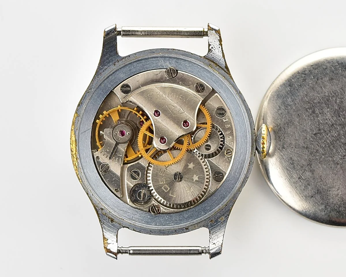 Vintage Soviet Pobeda with central second hand and diamond shaped crown, from 1954!
