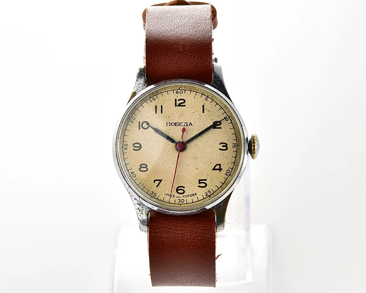 Vintage Soviet Pobeda with central second hand and diamond shaped crown, from 1954!