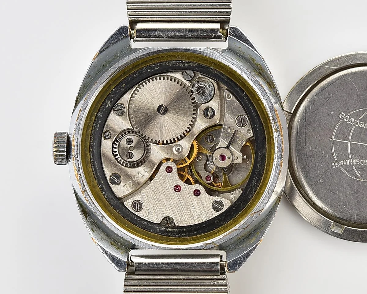 Soviet Pobeda mechanical wristwatch with Raketa stainless steel bracelet