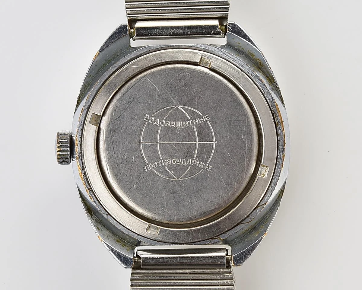 Soviet Pobeda mechanical wristwatch with Raketa stainless steel bracelet