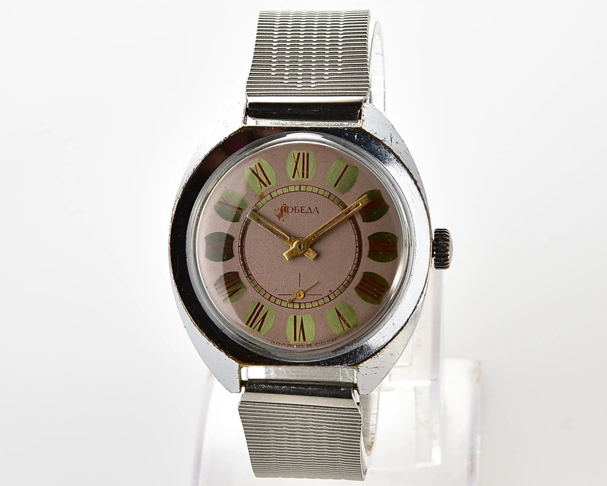 Soviet Pobeda mechanical wristwatch with Raketa stainless steel bracelet