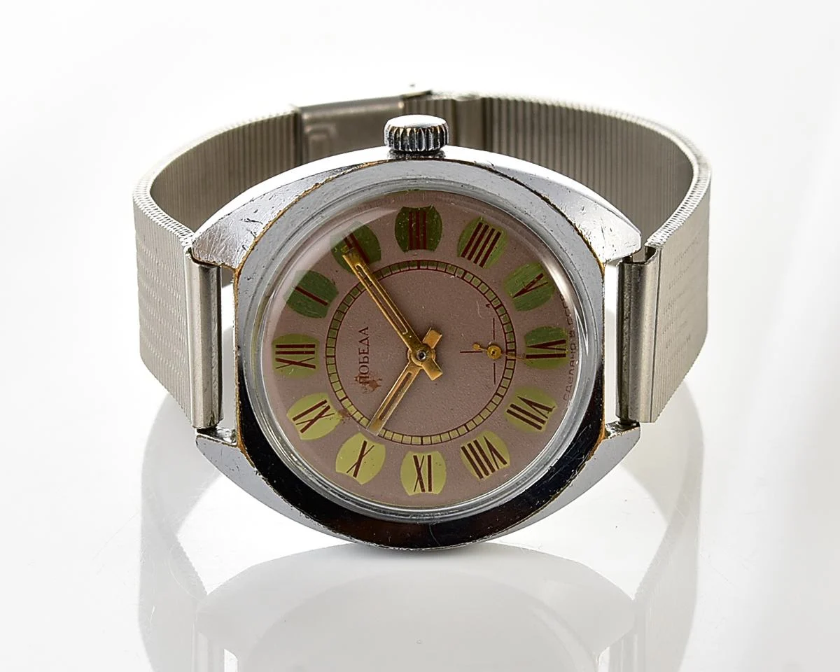 Soviet Pobeda mechanical wristwatch with Raketa stainless steel bracelet