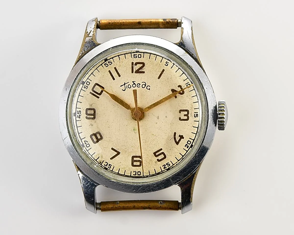 Vintage Soviet mechanical watch Pobeda Zim from the 1950s