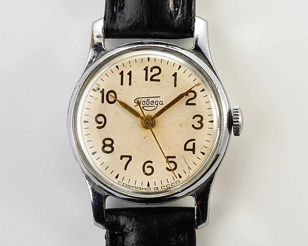 Vintage Soviet mechanical Pobeda watch with central second hand