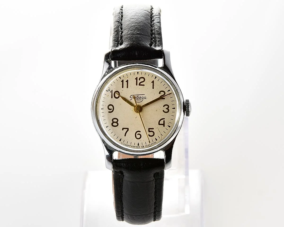 Vintage Soviet mechanical Pobeda watch with central second hand
