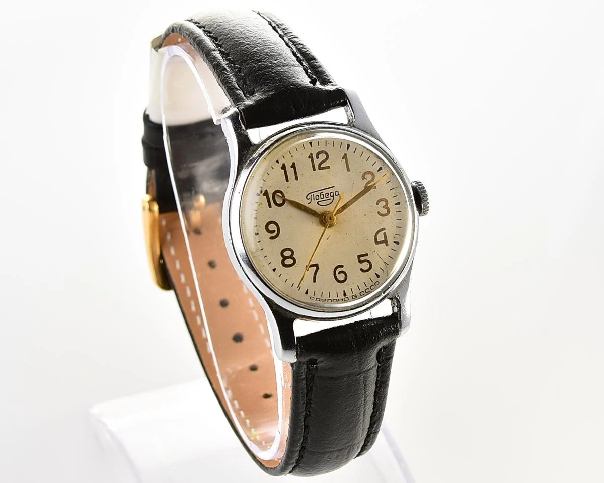 Vintage Soviet mechanical Pobeda watch with central second hand
