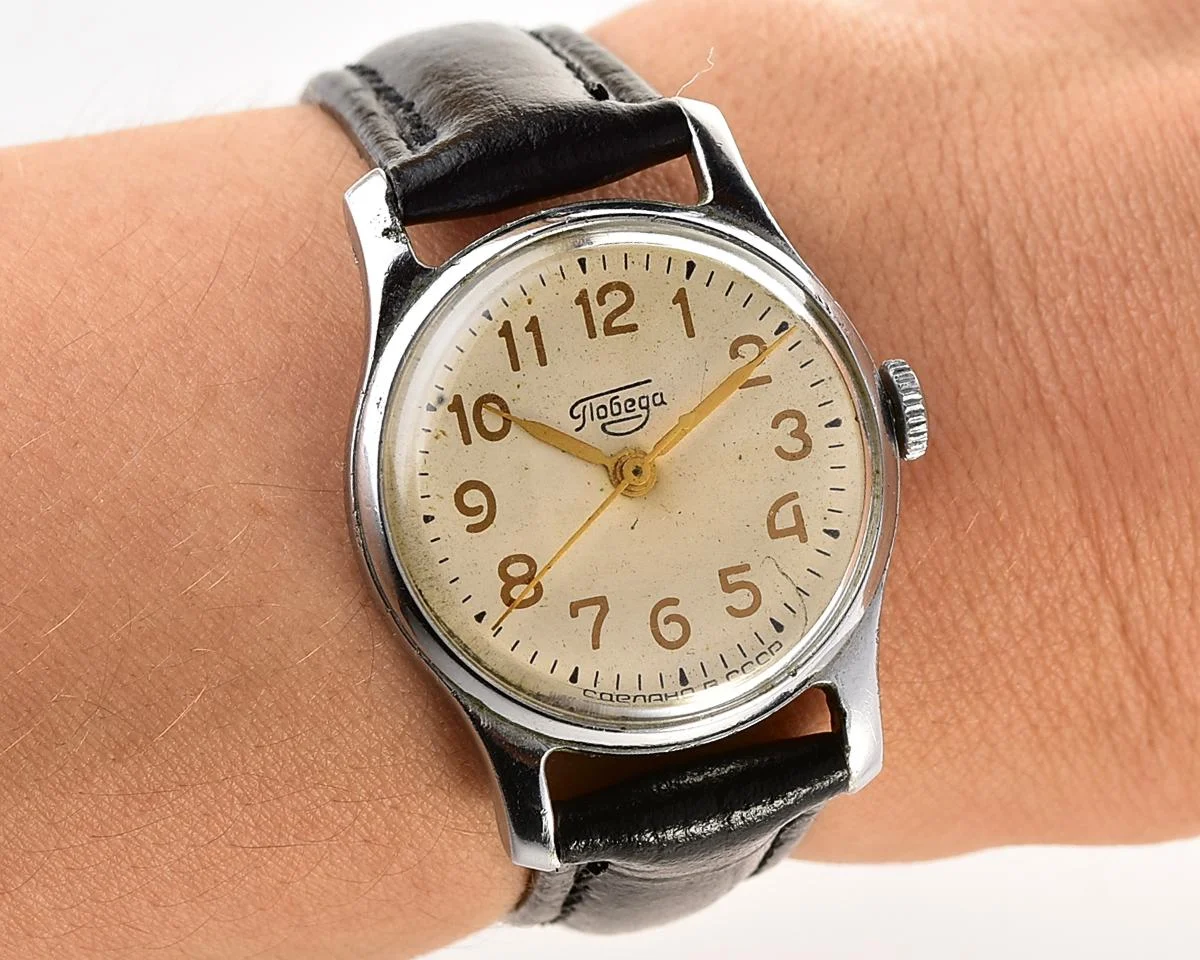 Vintage Soviet mechanical Pobeda watch with central second hand