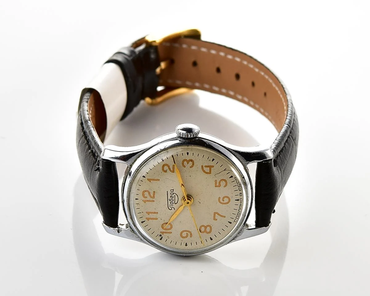Vintage Soviet mechanical Pobeda watch with central second hand