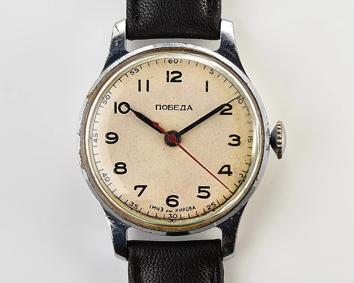 Excellent vintage Pobeda watch with central seconds hand and diamond shaped crown!
