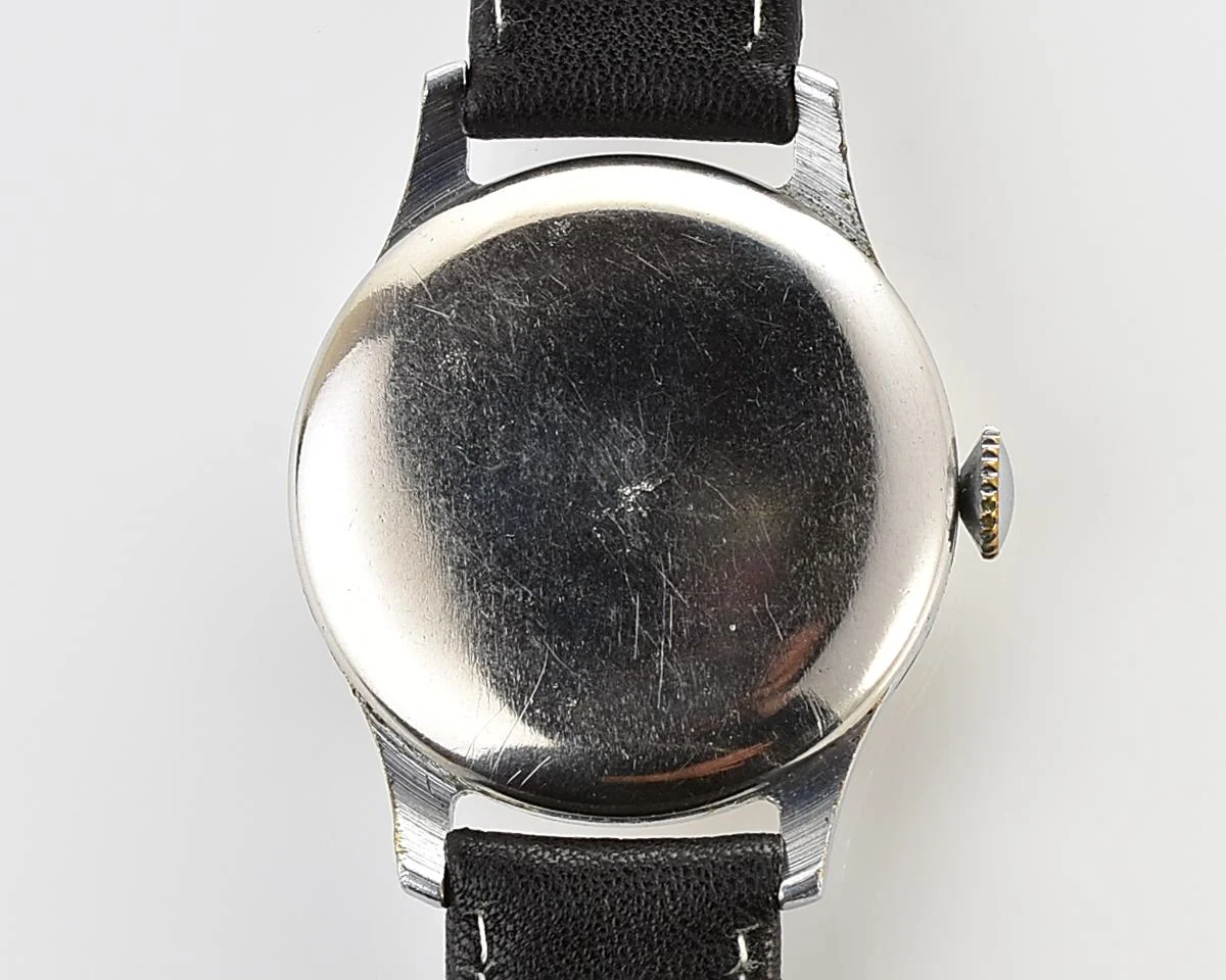 Excellent vintage Pobeda watch with central seconds hand and diamond shaped crown!
