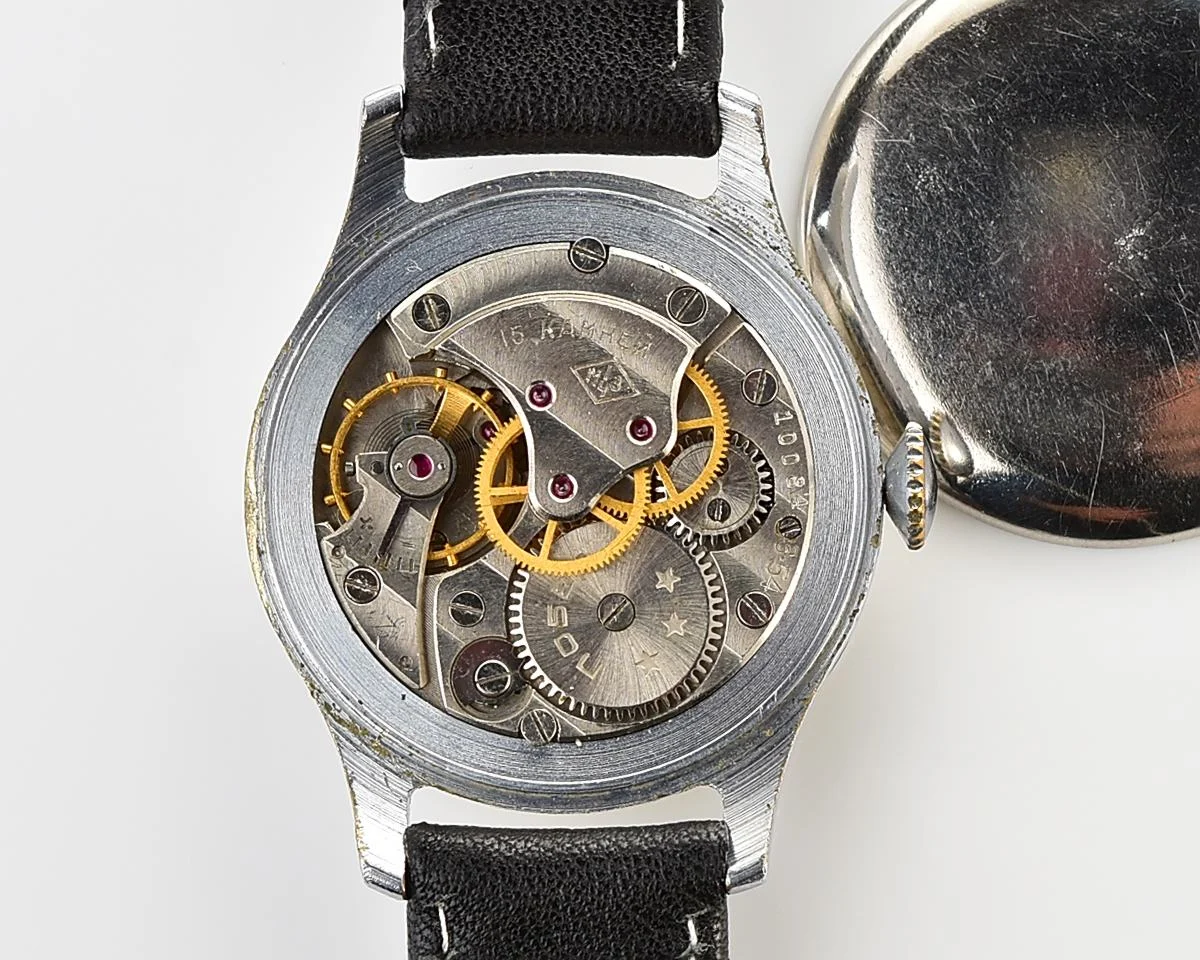 Excellent vintage Pobeda watch with central seconds hand and diamond shaped crown!