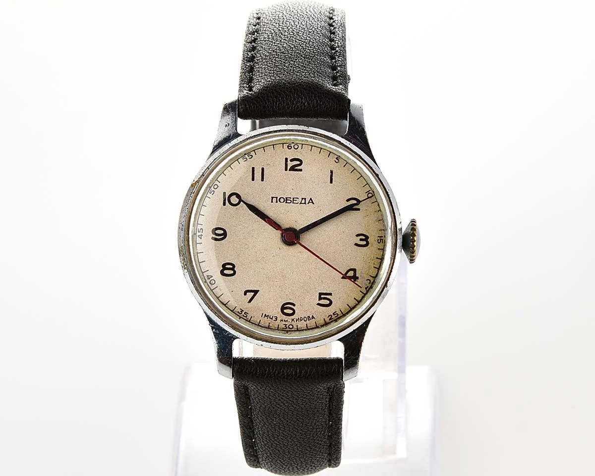 Excellent vintage Pobeda watch with central seconds hand and diamond shaped crown!