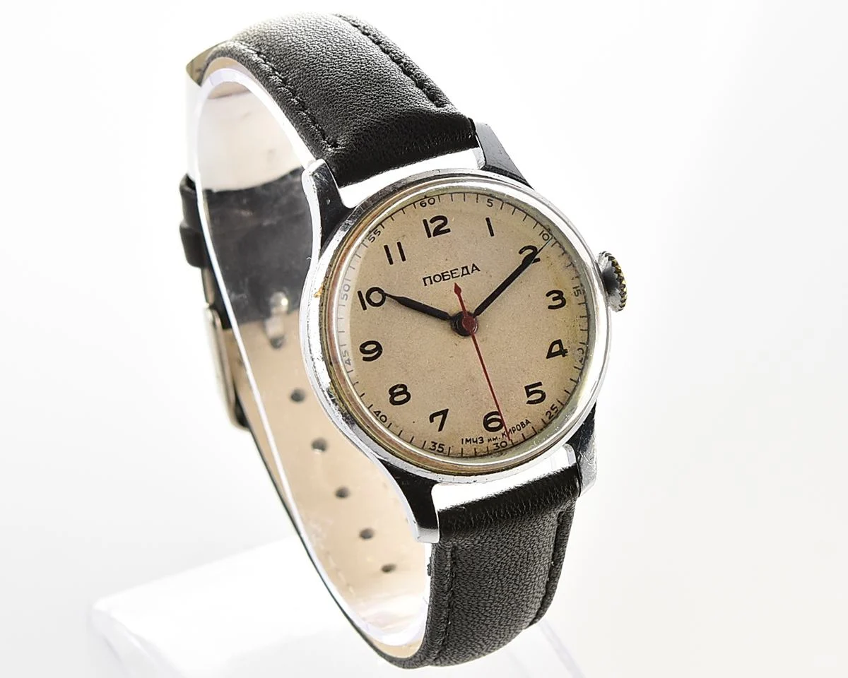 Excellent vintage Pobeda watch with central seconds hand and diamond shaped crown!