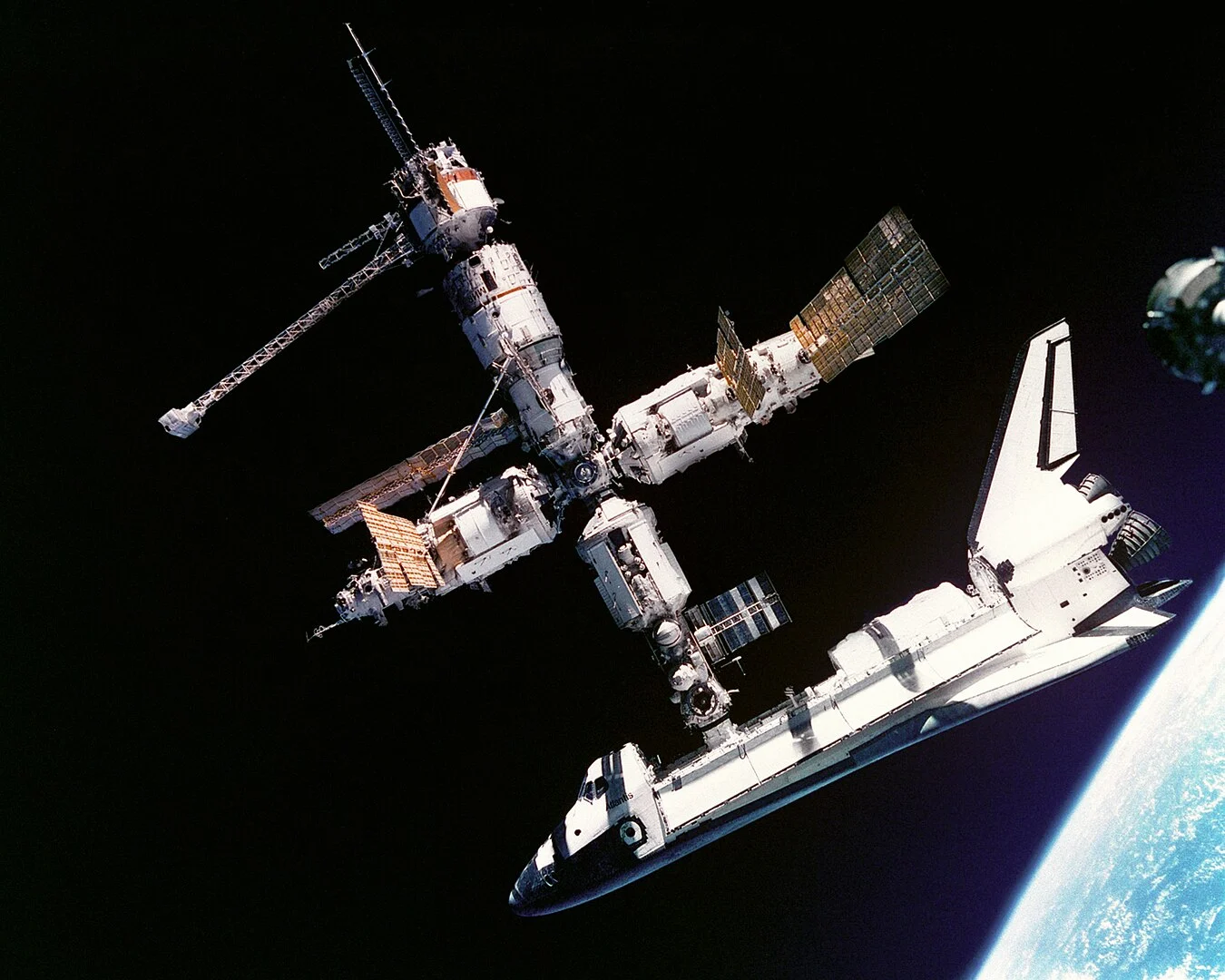 USA Space Shuttle Atlantis docked to MIR USA Space Shuttle Atlantis docked to MIR