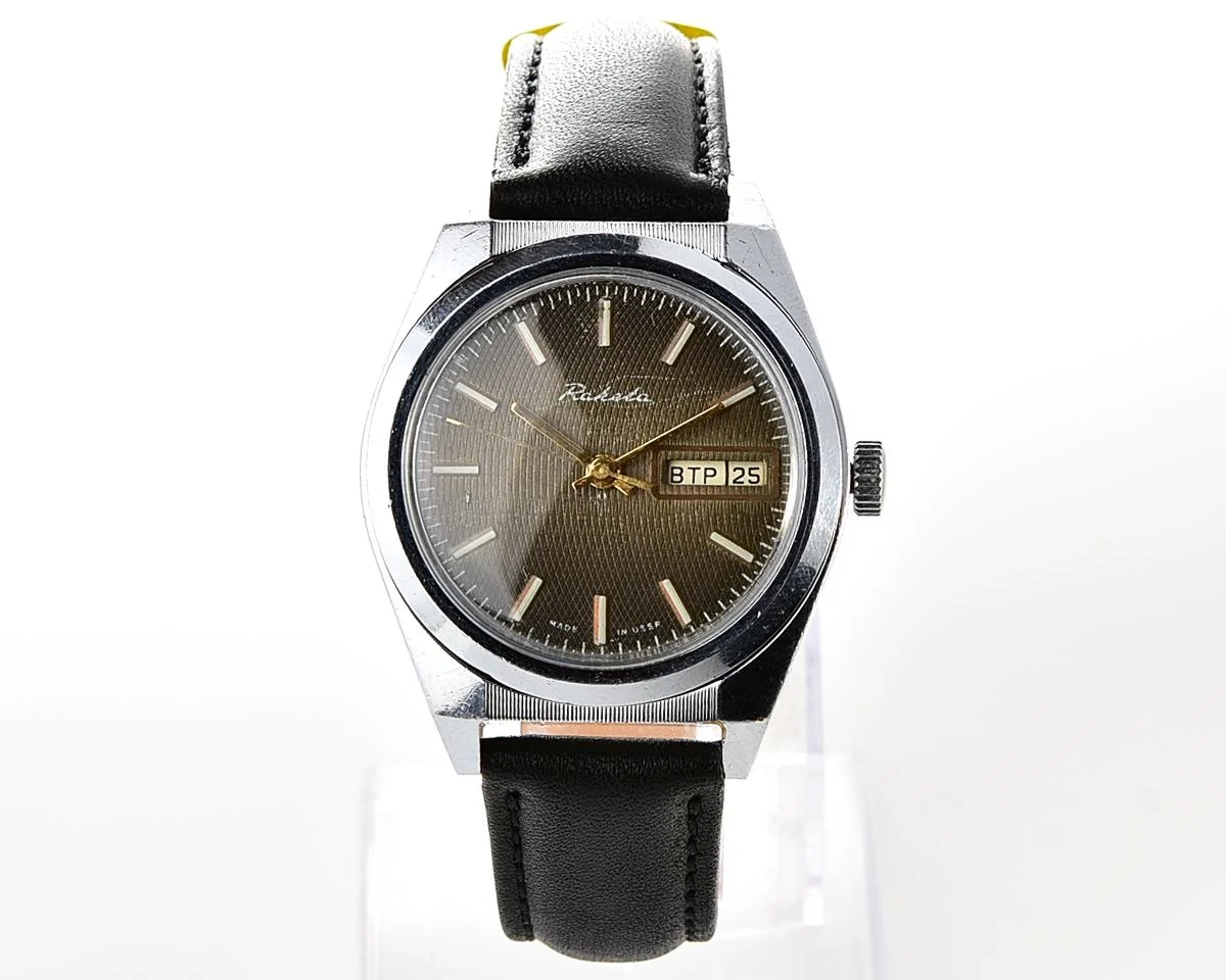Raketa vintage mechanical wrist watch with double calendar and uncommon textured dial!