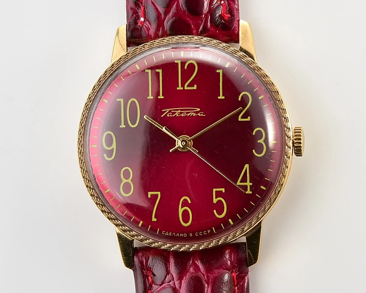 Excellent Soviet Raketa vintage mechanical gold-plated watch with beautiful crimson dial