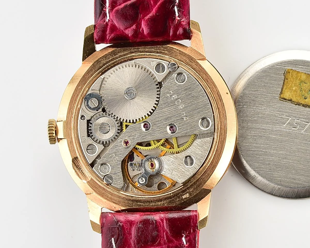 Excellent Soviet Raketa vintage mechanical gold-plated watch with beautiful crimson dial