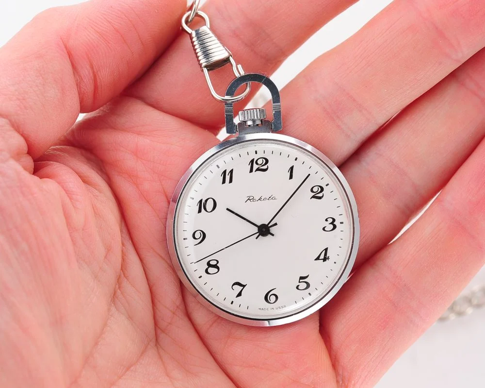 Mechanical Raketa Soviet pocket (or pendant) watch with roman numerals