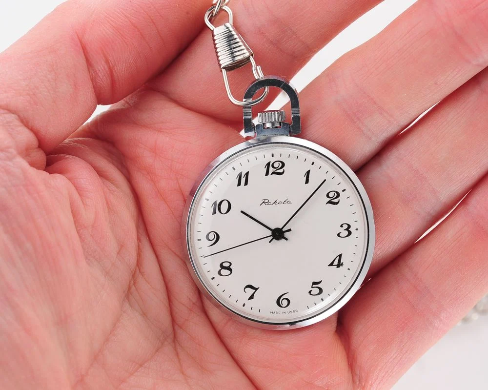 Mechanical Raketa Soviet pocket (or pendant) watch with roman numerals