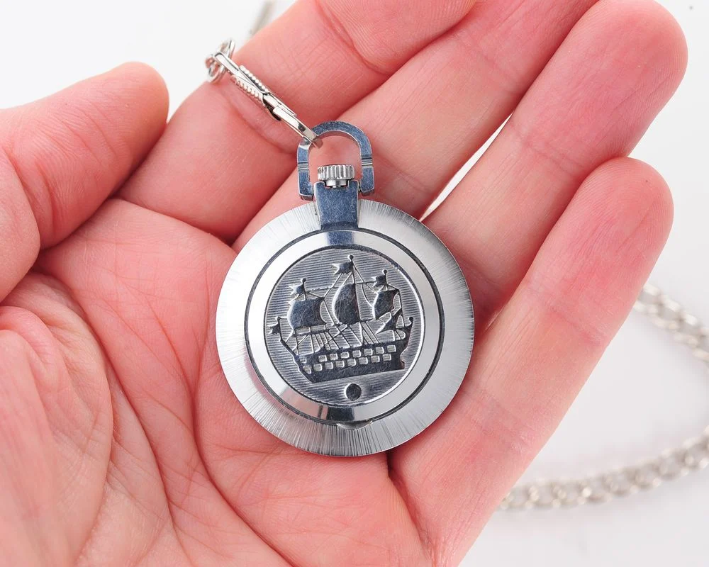 Mechanical Raketa Soviet pocket (or pendant) watch with roman numerals