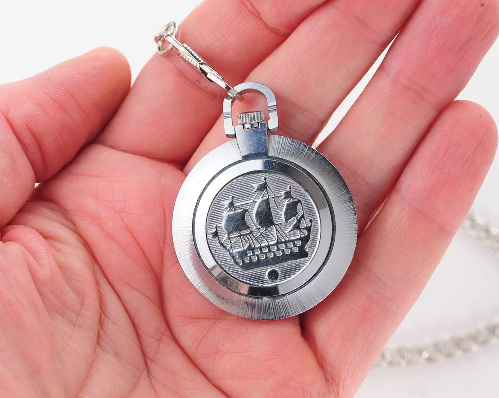 Mechanical Raketa Soviet pocket (or pendant) watch with roman numerals