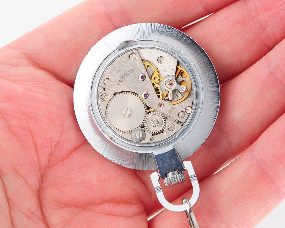 Mechanical Raketa Soviet pocket (or pendant) watch with roman numerals