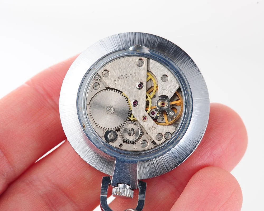Mechanical Raketa Soviet pocket (or pendant) watch with roman numerals