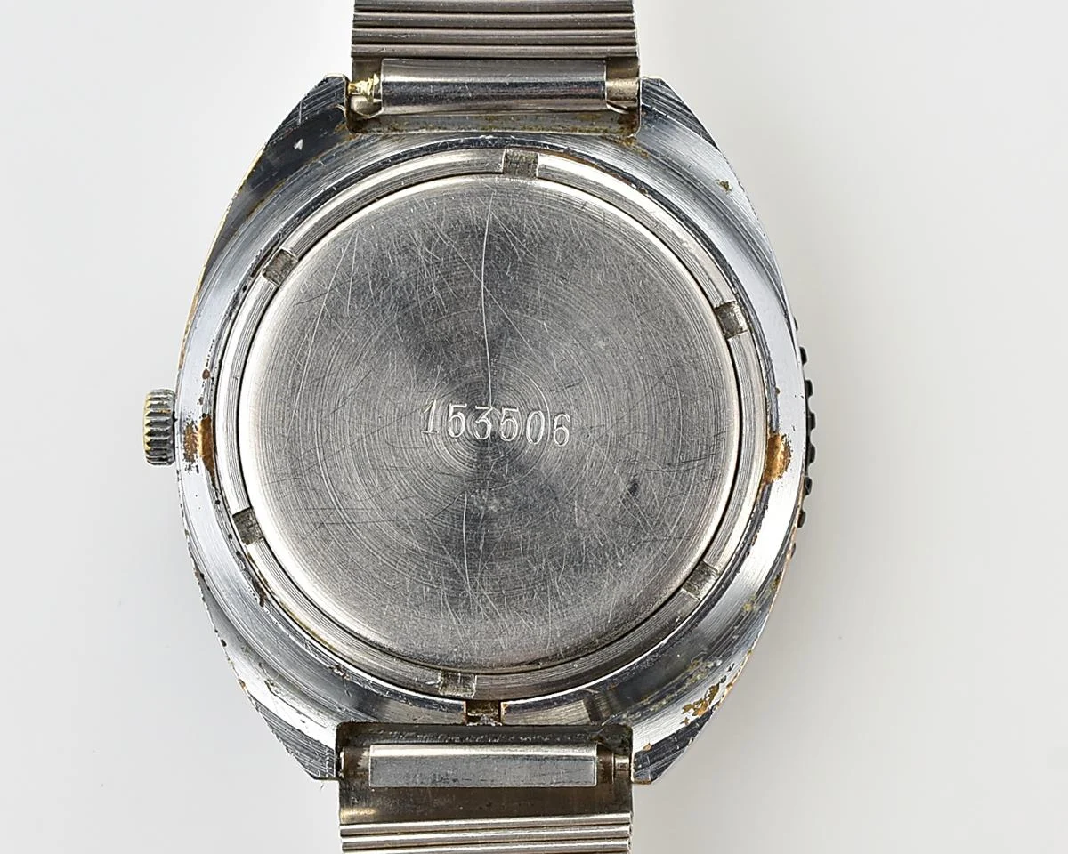Vintage Soviet Raketa quartz watch with rotating bezel & Raketa branded steel bracelet!
