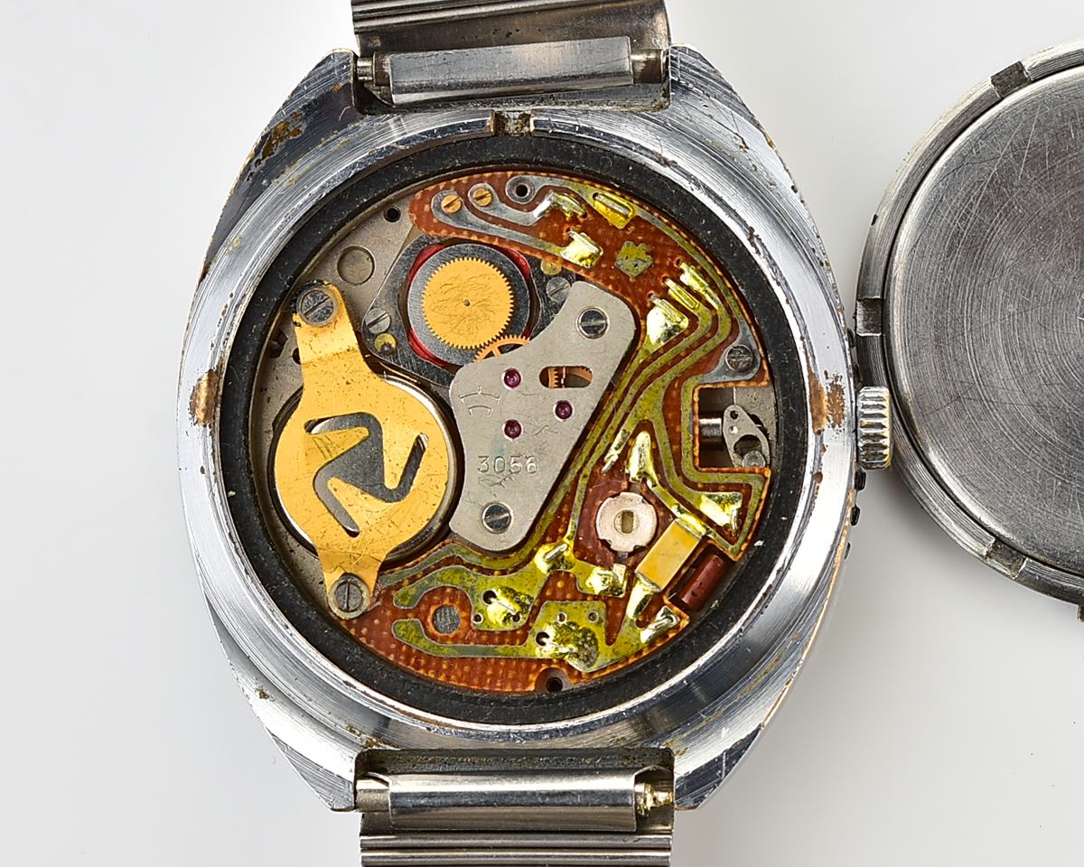 Vintage soviet RAKETA quartz watch with rotating bezel & Raketa branded steel bracelet!