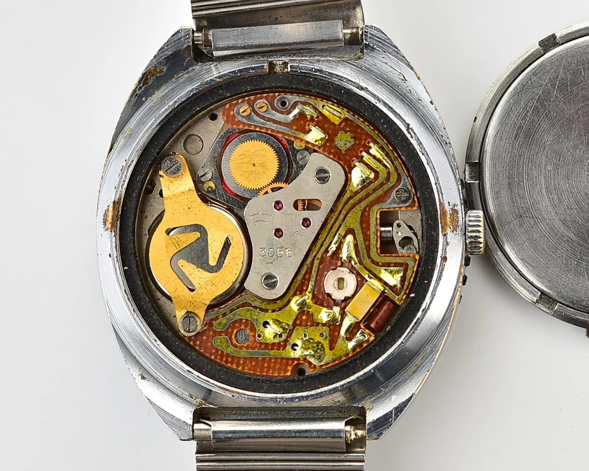 Vintage Soviet Raketa quartz watch with rotating bezel & Raketa branded steel bracelet!