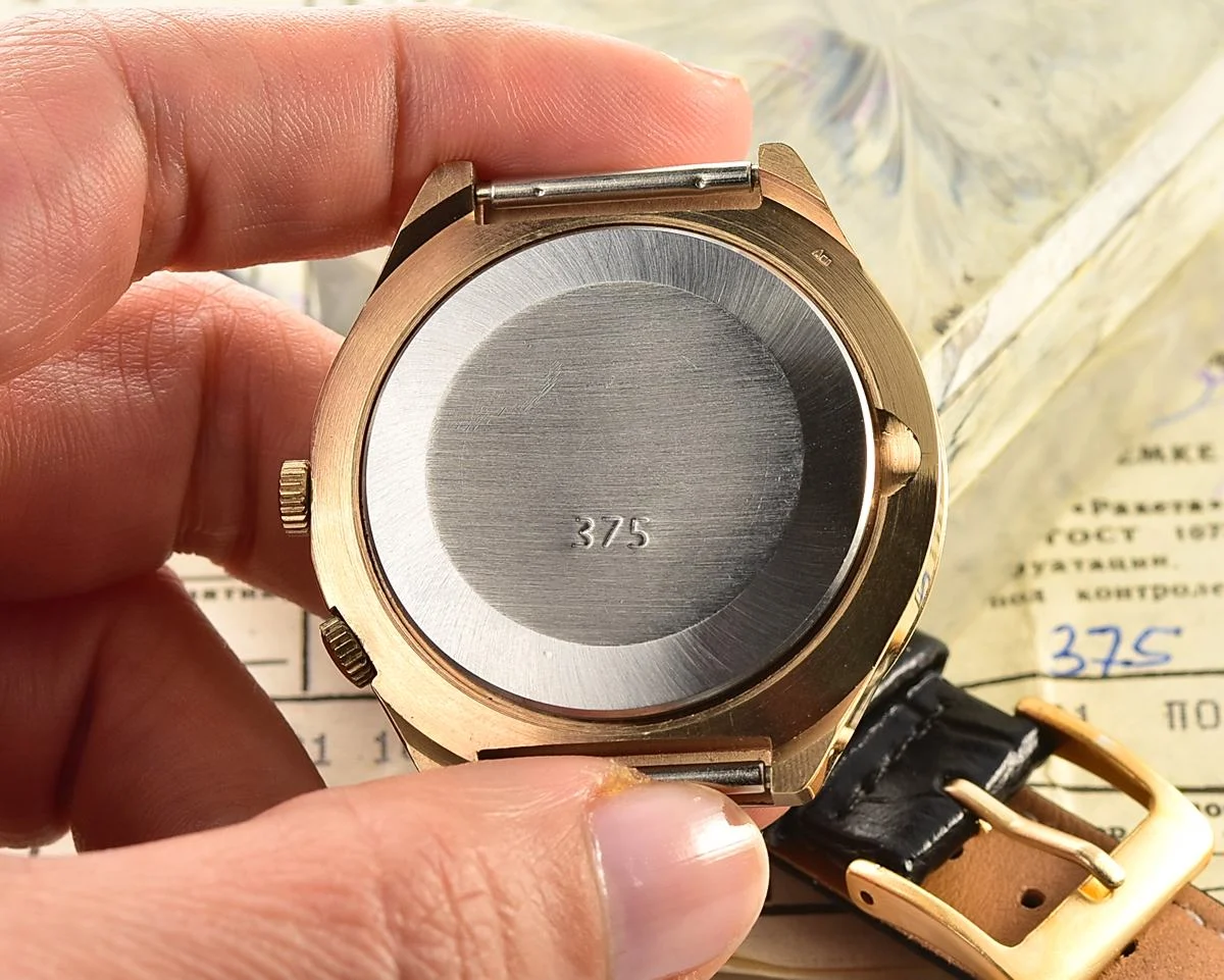 TIME CAPSULE: Vintage Soviet Raketa gold-plated perpetual calendar watch – New Old Stock (NOS)!