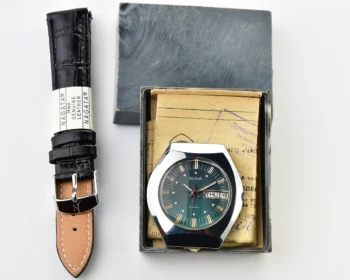 Time Capsule: Slava Soviet mechanical vintage watch with teal dial - New Old Stock (NOS)!
