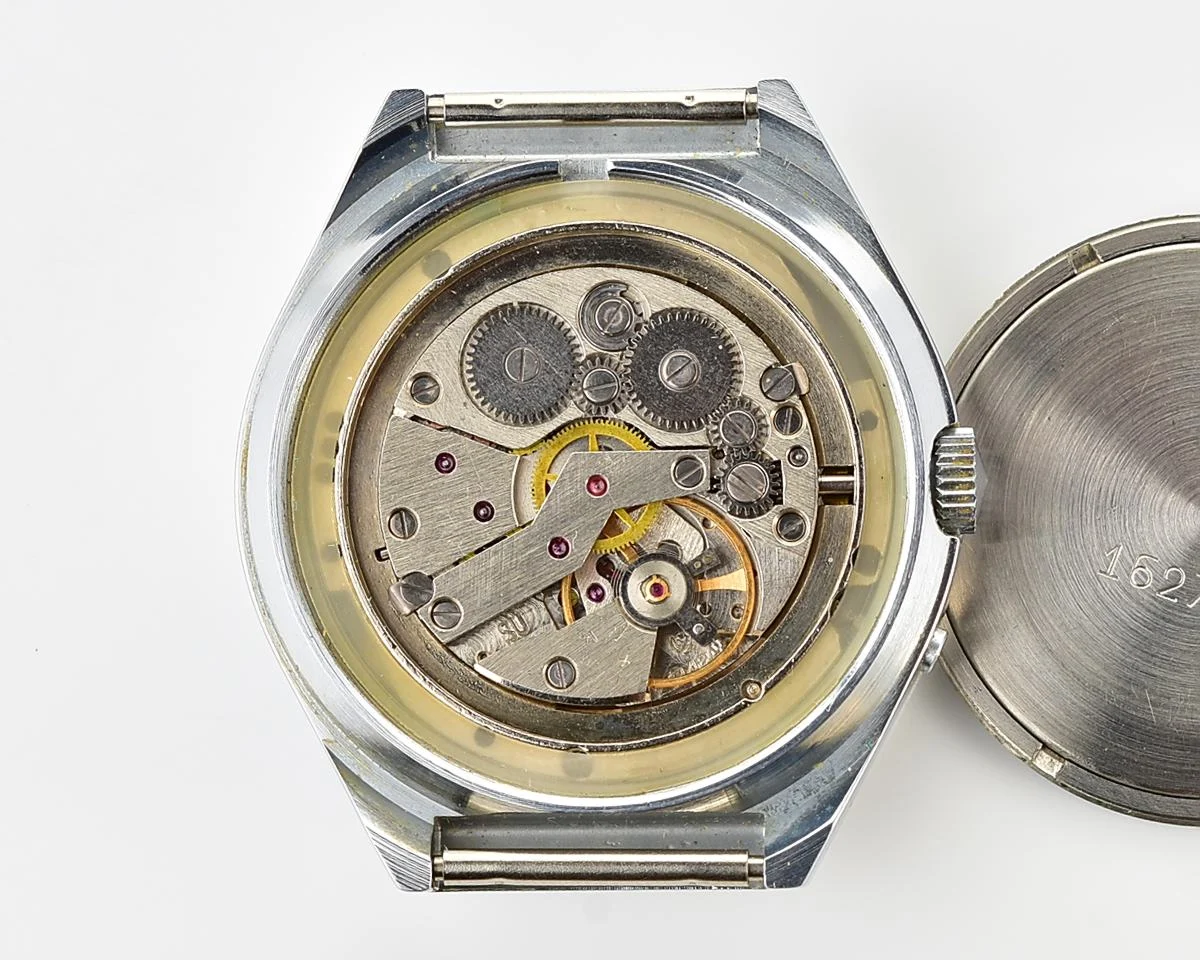 Time Capsule: Slava Soviet mechanical vintage watch with teal dial - New Old Stock (NOS)!