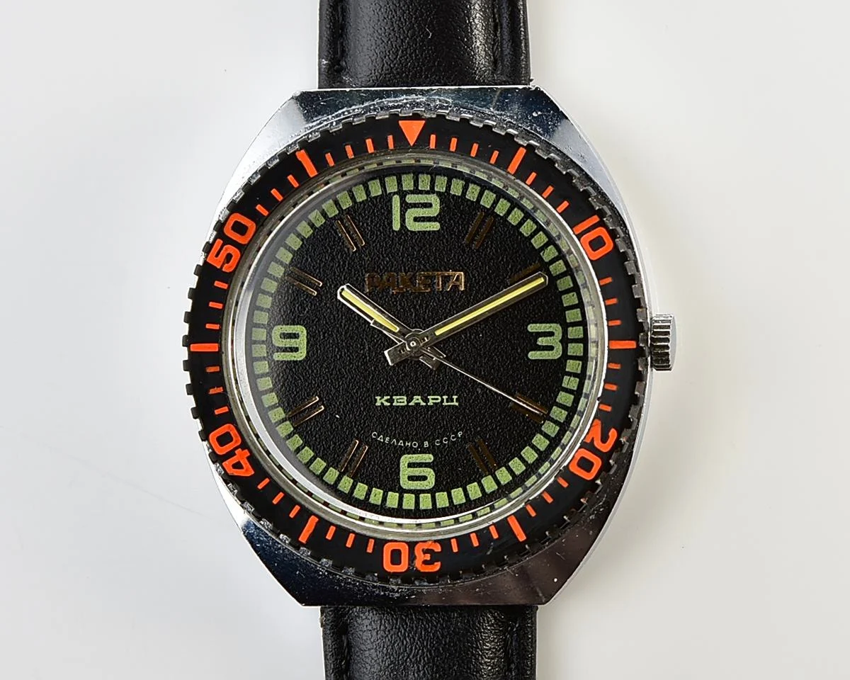 Excellent vintage Soviet Raketa quartz watch with rotating bezel