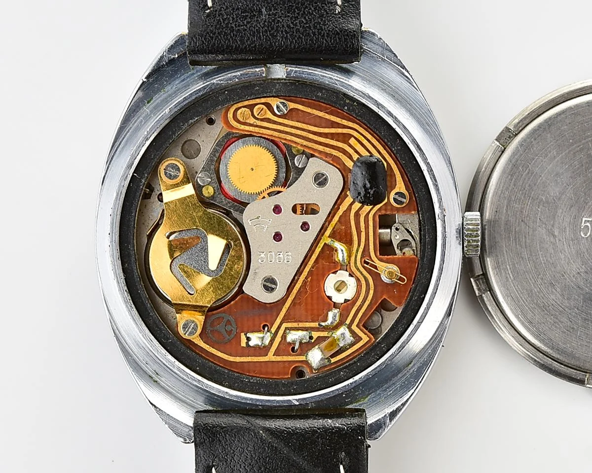 Excellent vintage Soviet Raketa quartz watch with rotating bezel
