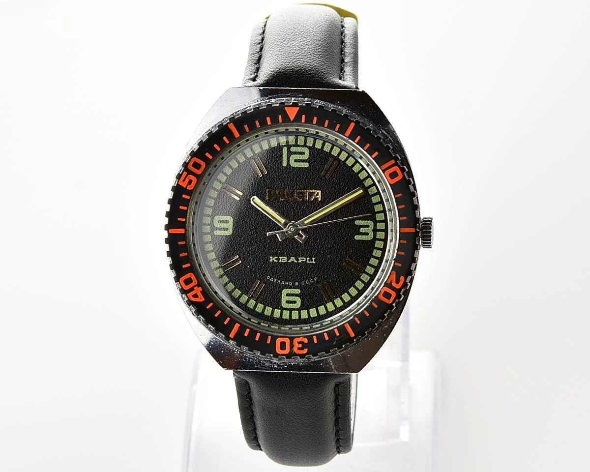 Excellent vintage Soviet Raketa quartz watch with rotating bezel