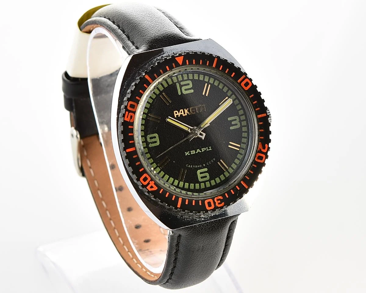 Excellent vintage Soviet Raketa quartz watch with rotating bezel