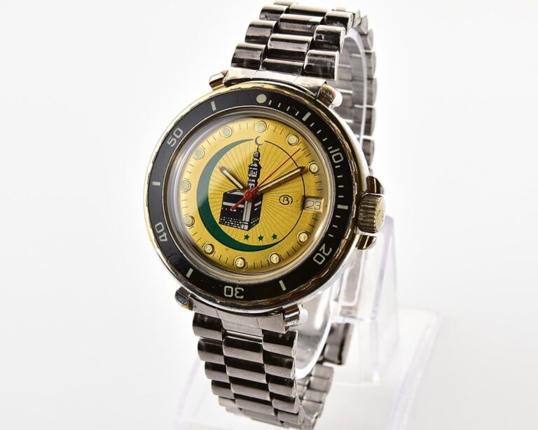 Soviet Komandirskie vintage mechanical wristwatch with Kaaba & minaret on it's gold-toned sunburst dial