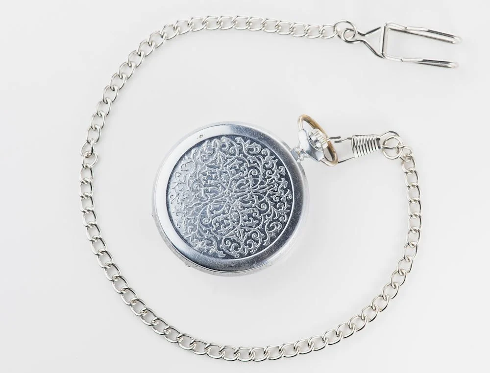 Mechanical Molnija Soviet pocket watch with red dial