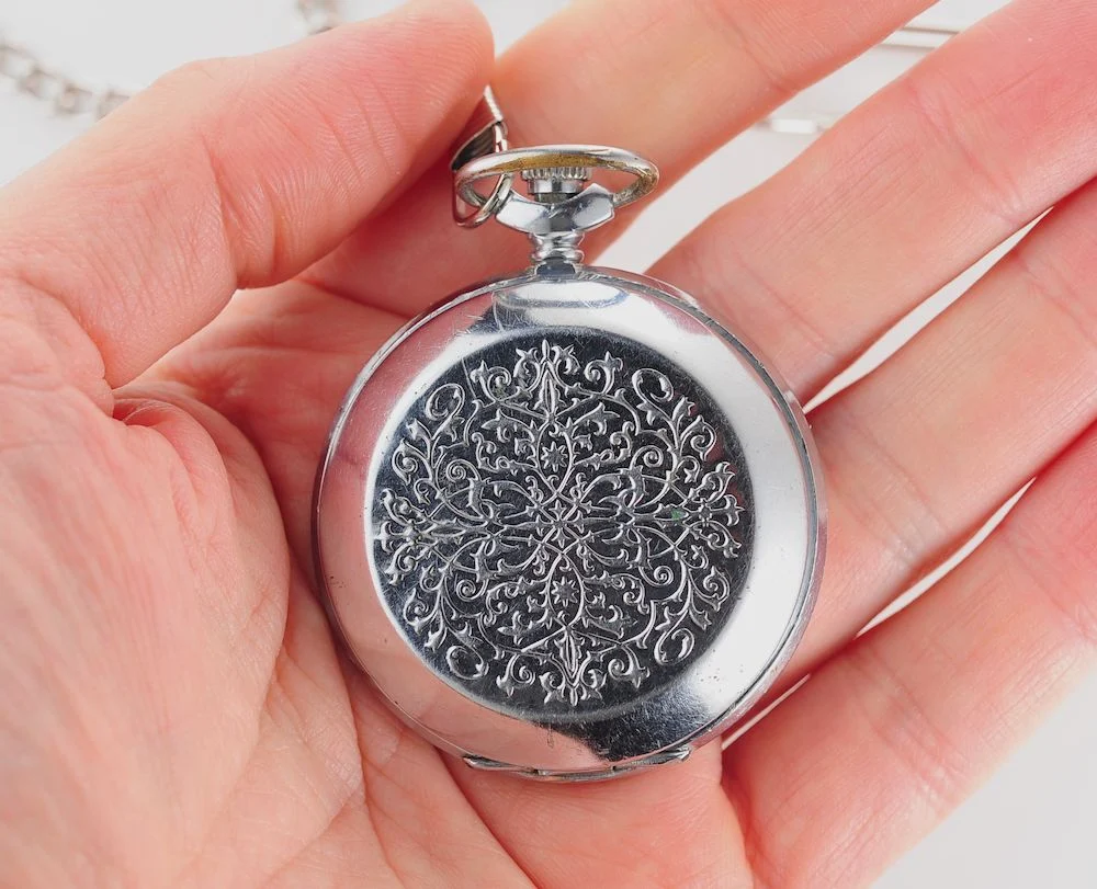Mechanical Molnija Soviet pocket watch with red dial