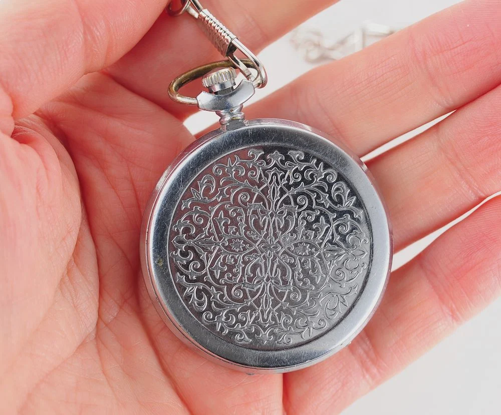 Mechanical Molnija Soviet pocket watch with red dial