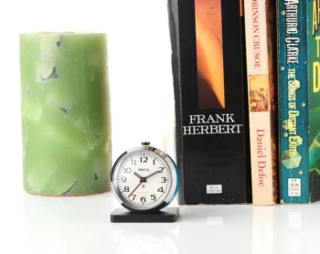 Small Raketa Soviet mechanical alarm clock - less than 2 inches in diameter