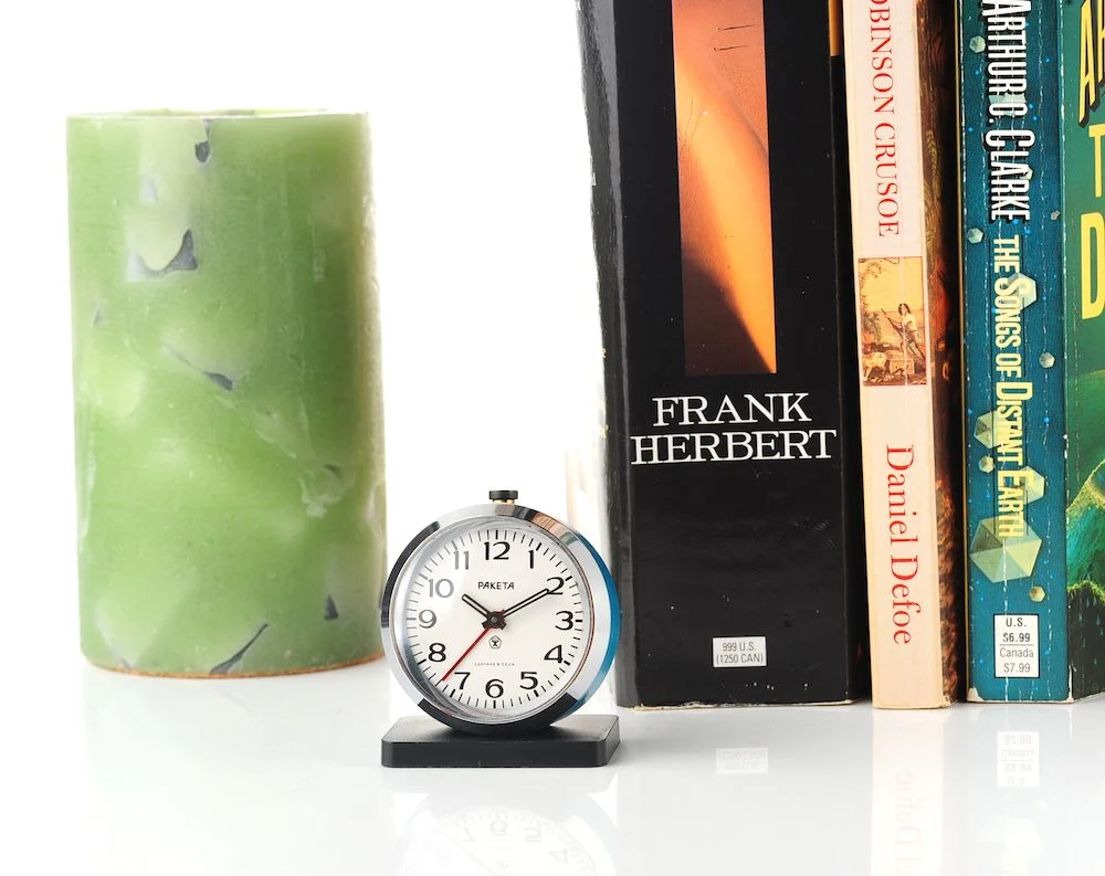 Small Raketa Soviet mechanical alarm clock - less than 2 inches in diameter