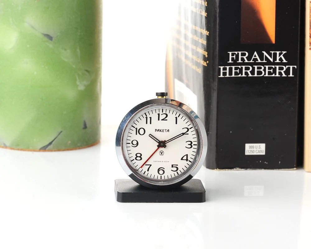 Small Raketa Soviet mechanical alarm clock - less than 2 inches in diameter