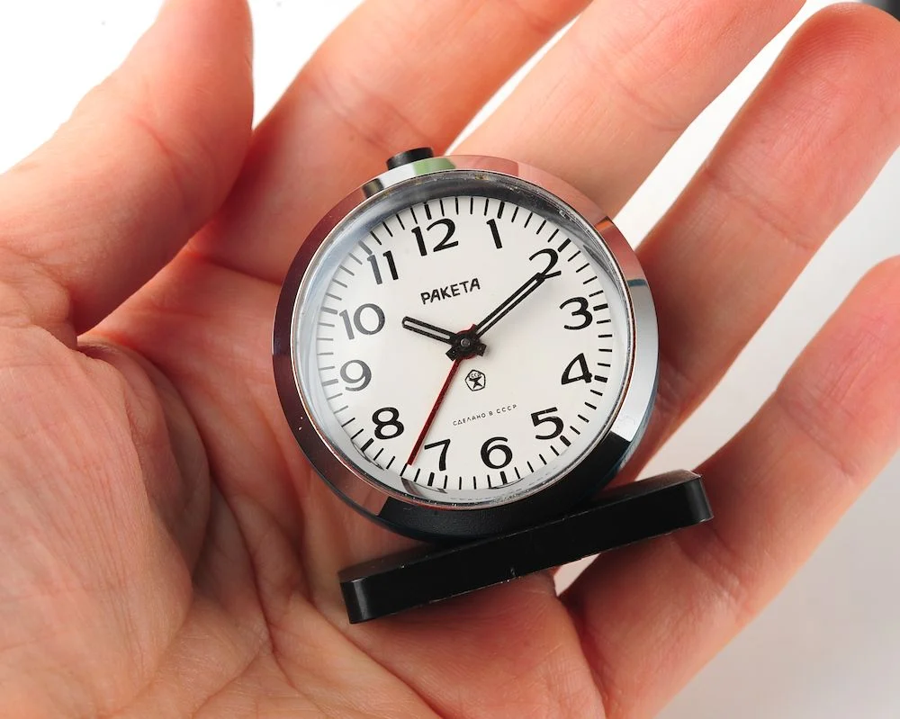 Small Raketa Soviet mechanical alarm clock - less than 2 inches in diameter