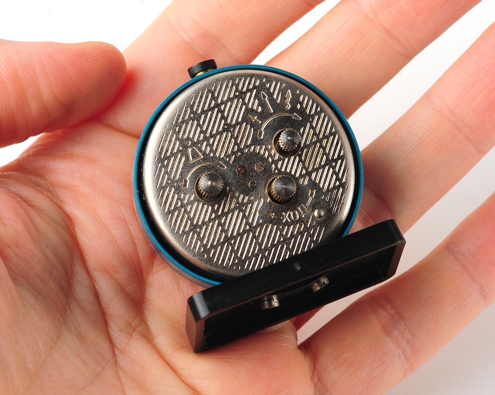 Small Raketa soviet mechanical alarm clock - less than 2 inches in diameter