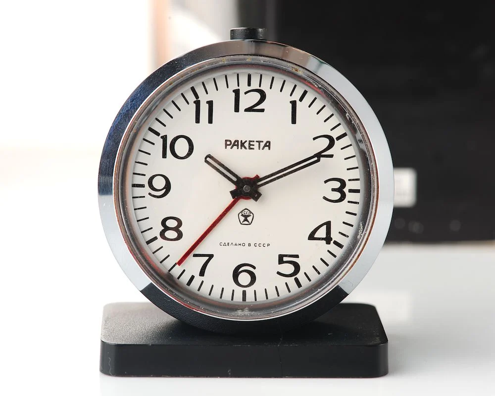 Small Raketa Soviet mechanical alarm clock - less than 2 inches in diameter