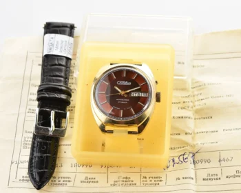 Slava Soviet gold-plated vintage mechanical watch with automatic self-winding movement - complete with box and passport!